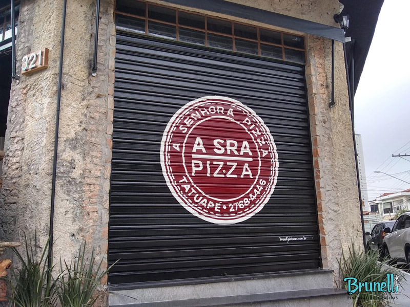 pintura de letreiro em porta de ao a senhora pizza