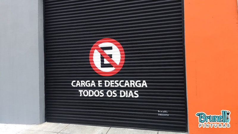 pintura de letreiro em porta de aço proibido estacionar