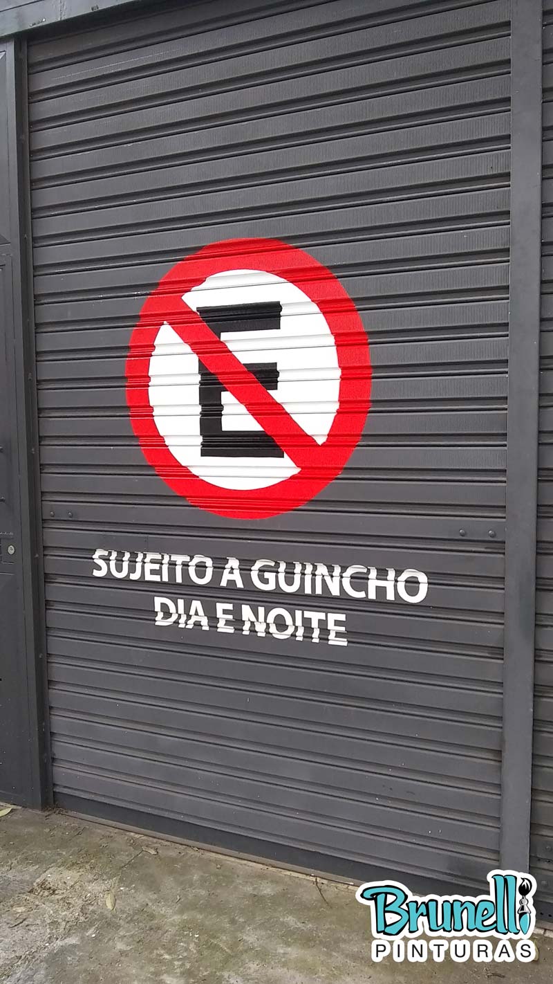 pintura de letreiro em porta de aço proibido estacionar