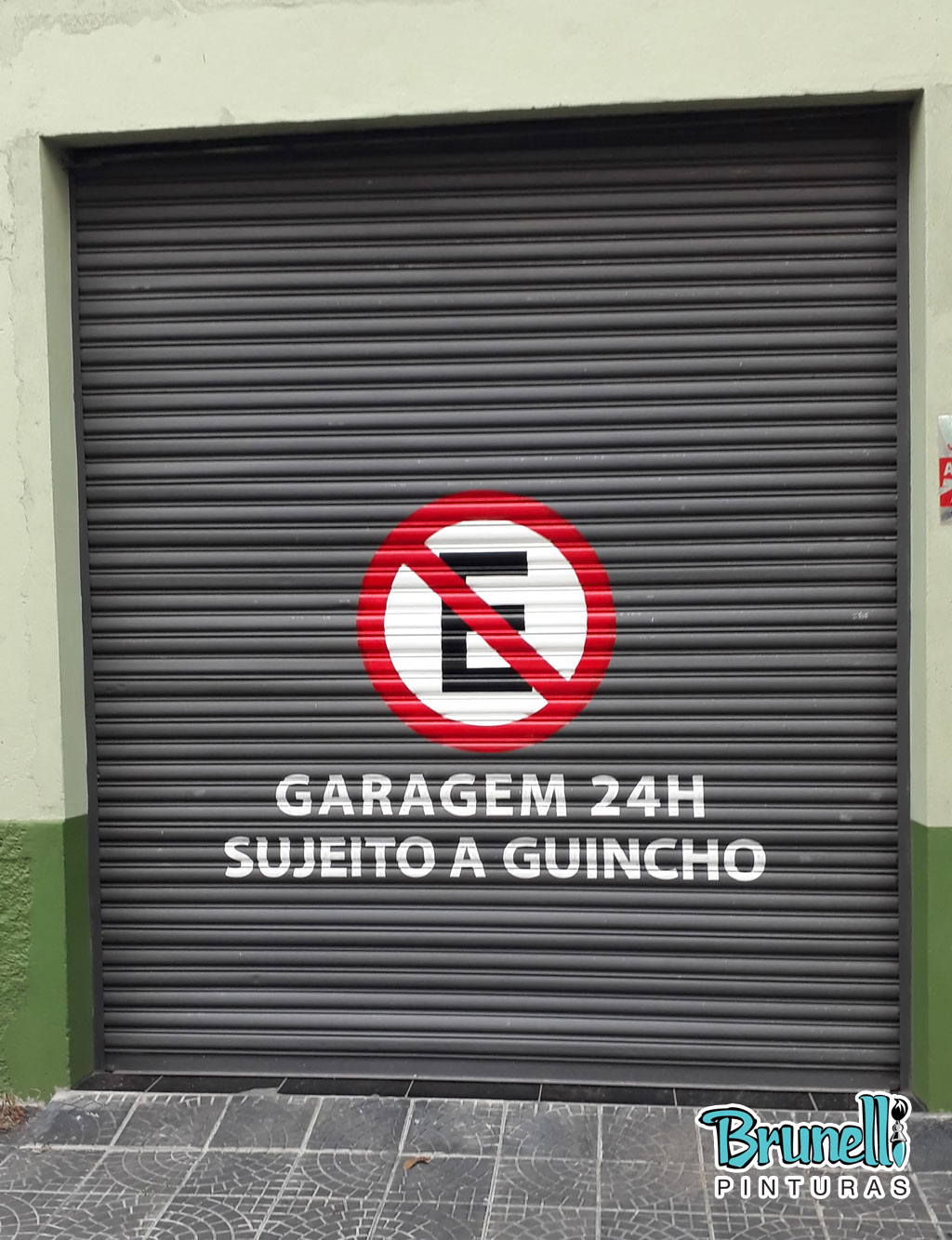 pintura de letreiro em porta de aço proibido estacionar