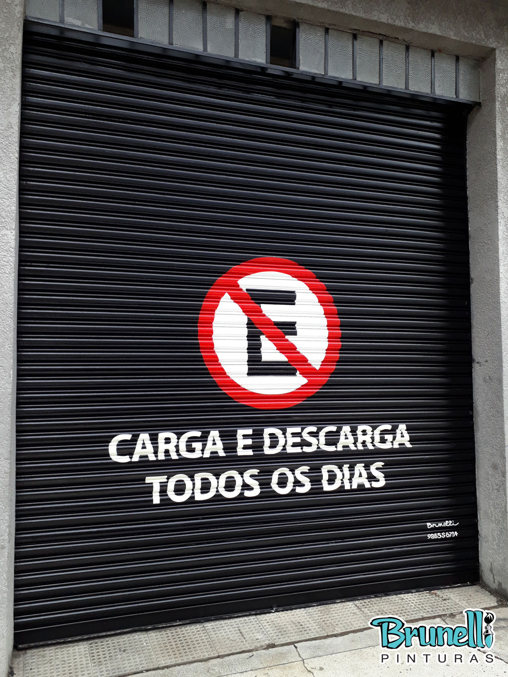 pintura de letreiro em porta de aço proibido estacionar