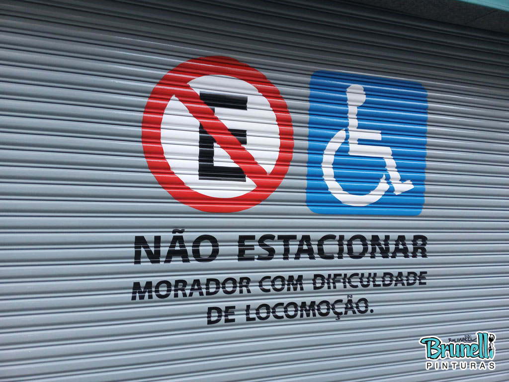 pintura de letreiro em porta de aço proibido estacionar