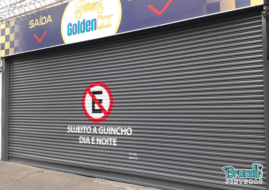 pintura de letreiro em porta de aço proibido estacionar